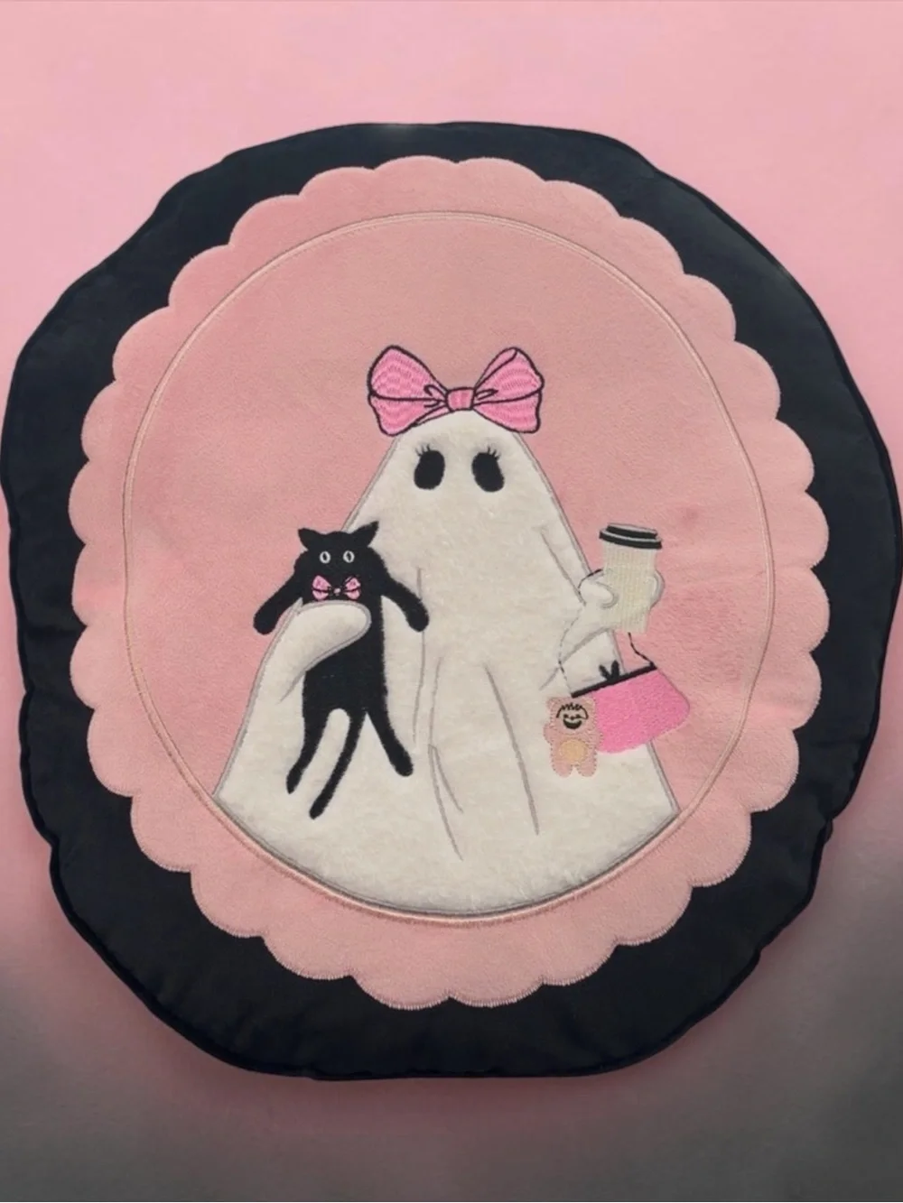 Pink Ghost Embroidered Round Accent Pillow with Black Trim